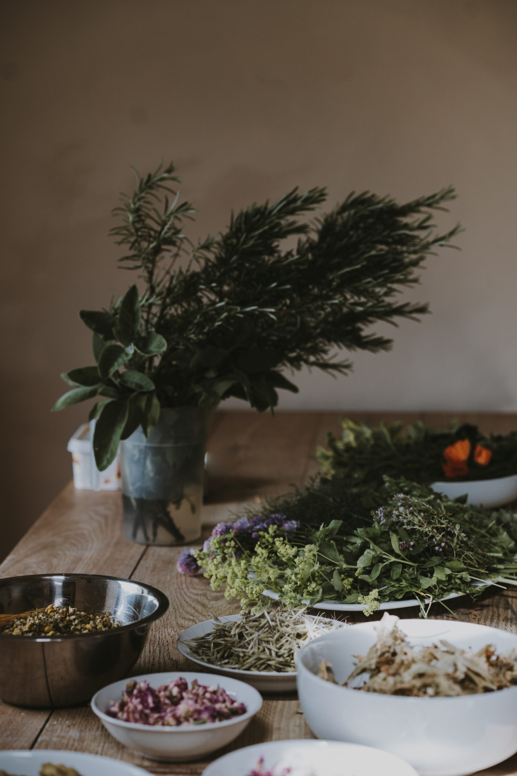 Fresh herbs laid out on a table